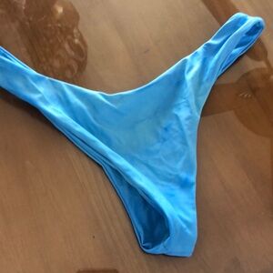Blue toying bathing suit bottoms